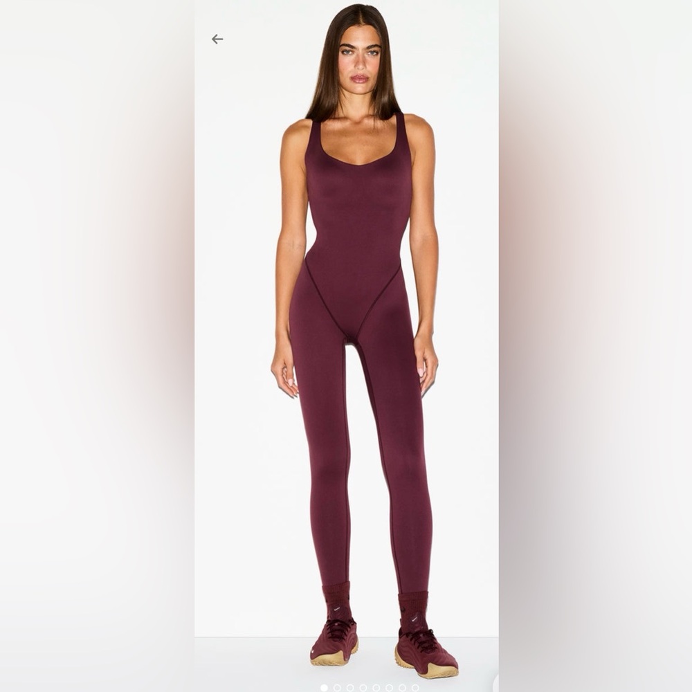 NikeSKIMS Matte 
Racer Long Onesie
Current (Burgundy Full-Length Bodysuit)